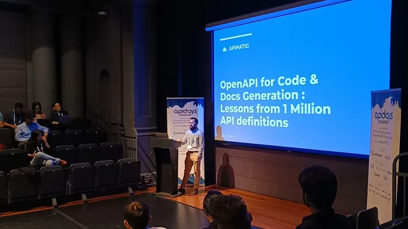 Sohaib Tariq presenting at apidays Singapore beside a slide titled OpenAPI for Code and Docs Generation